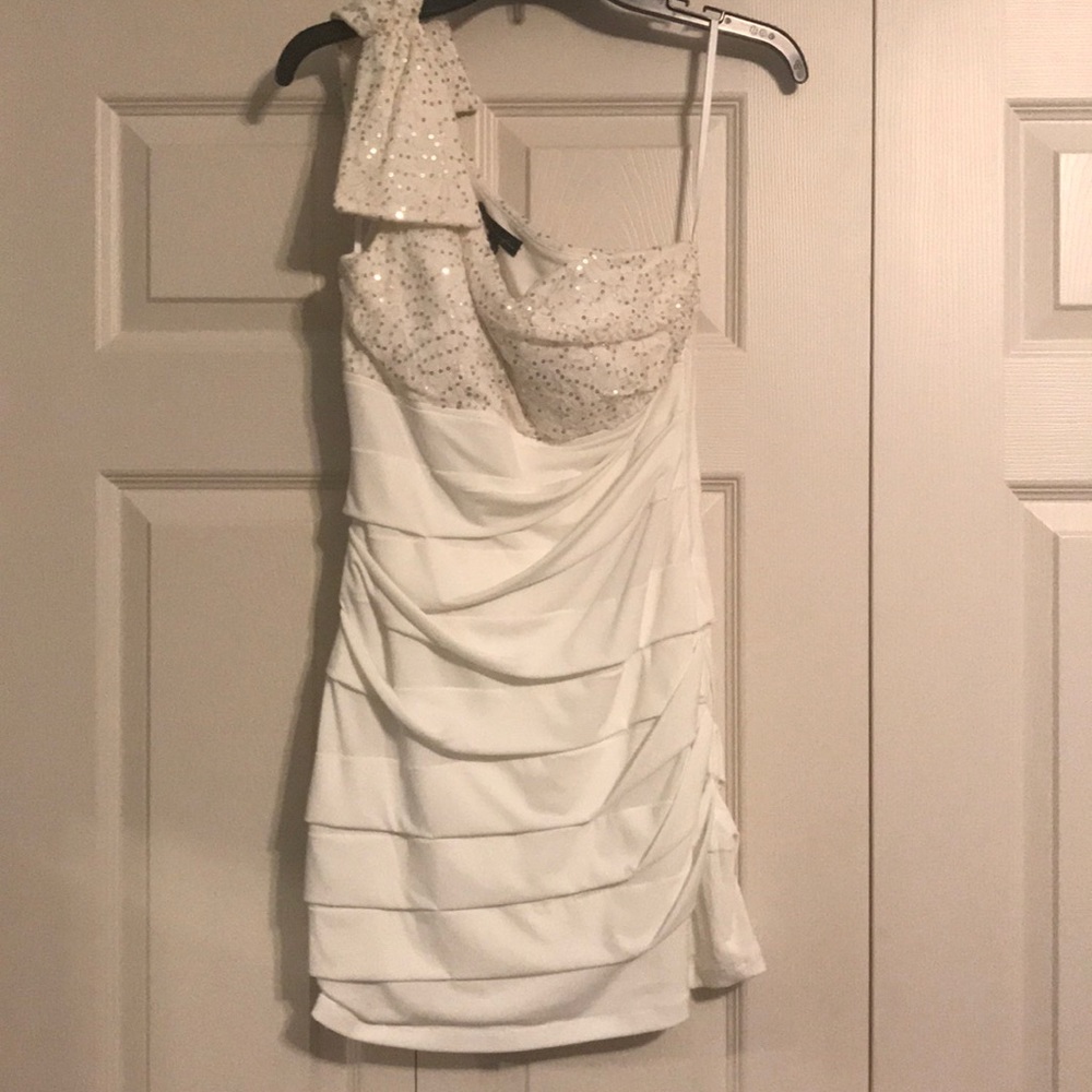 Cream colored one shoulder dress